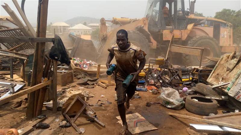 One Injured, Vehicle Set Ablaze As Scavengers, Enugu Taskforce Clash