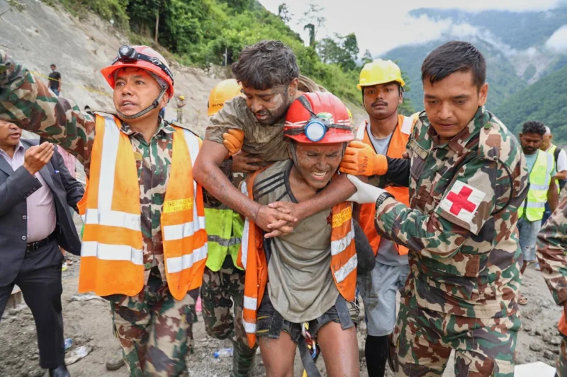 Two trapped workers rescued nine days after Nepal Floods