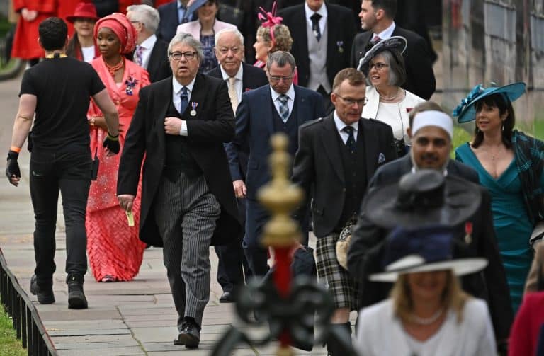 Reactions As Nigerian Aide To King Charles III Rocks Stunning Gele To His Coronation