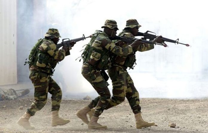 BREAKING: Troops Capture Fleeing IPOB/ESN Fighter, Recovers More Firearms [Photos]