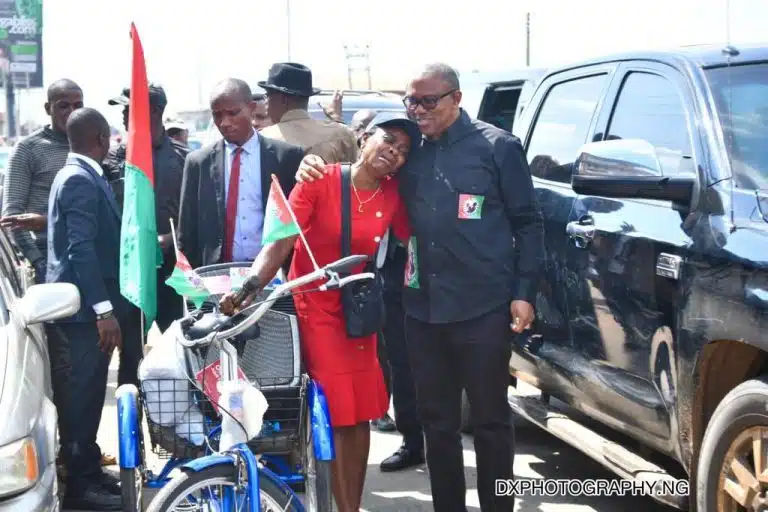 Reactions As Emotional Photo Of Obi With Teary Female Supporter Surfaces Online
