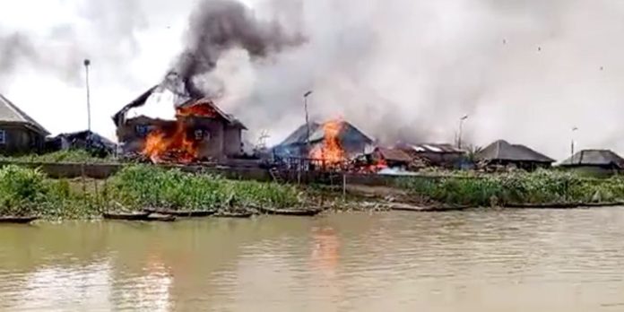 BREAKING: Residents Flee As Angry Nigerian Soldiers Burn Down Delta Community In Retaliation For Killing Of 16 Officials