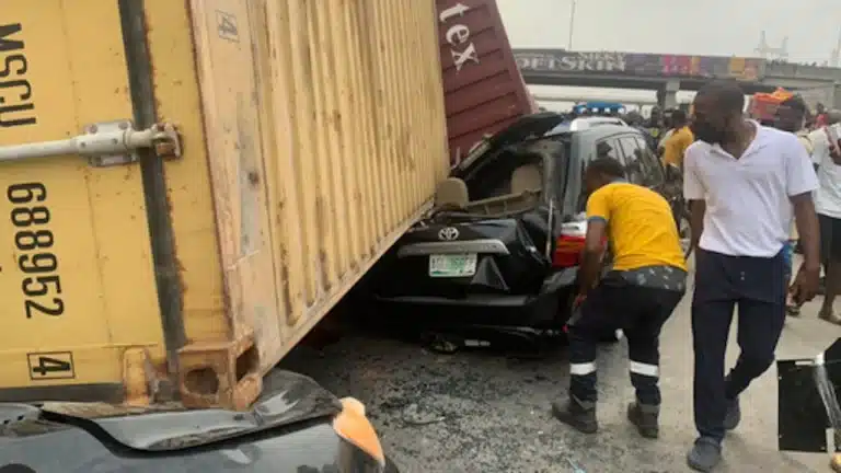 Tension As Truck Falls On Commercial Bus In Lagos