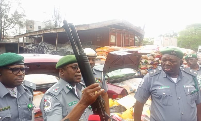 breaking:%20Customs%20Seize%20Pump-Action%20Rifles%20Concealed%20in%20Garri%20Sacks