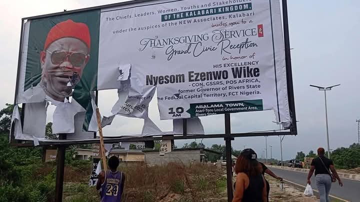 Protesting Ijaw Women Tear Down Wike’s Billboards in Kalabari Over Controversial Visit