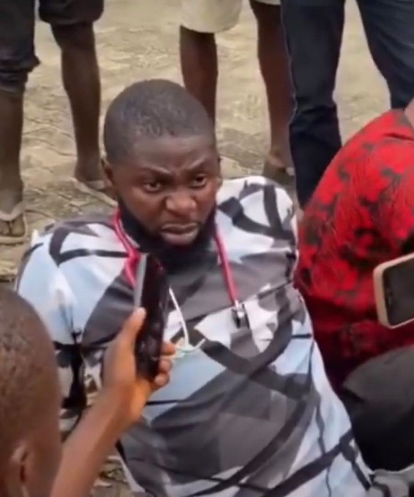 VIDEO: Man Allegedly Posing as Doctor Caught at Rivers Health Centre Over Suspected Transfer Scam